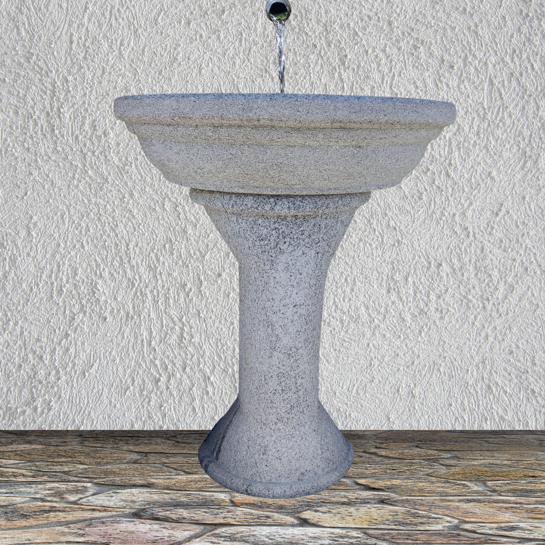 Wall fountain in ancient granite