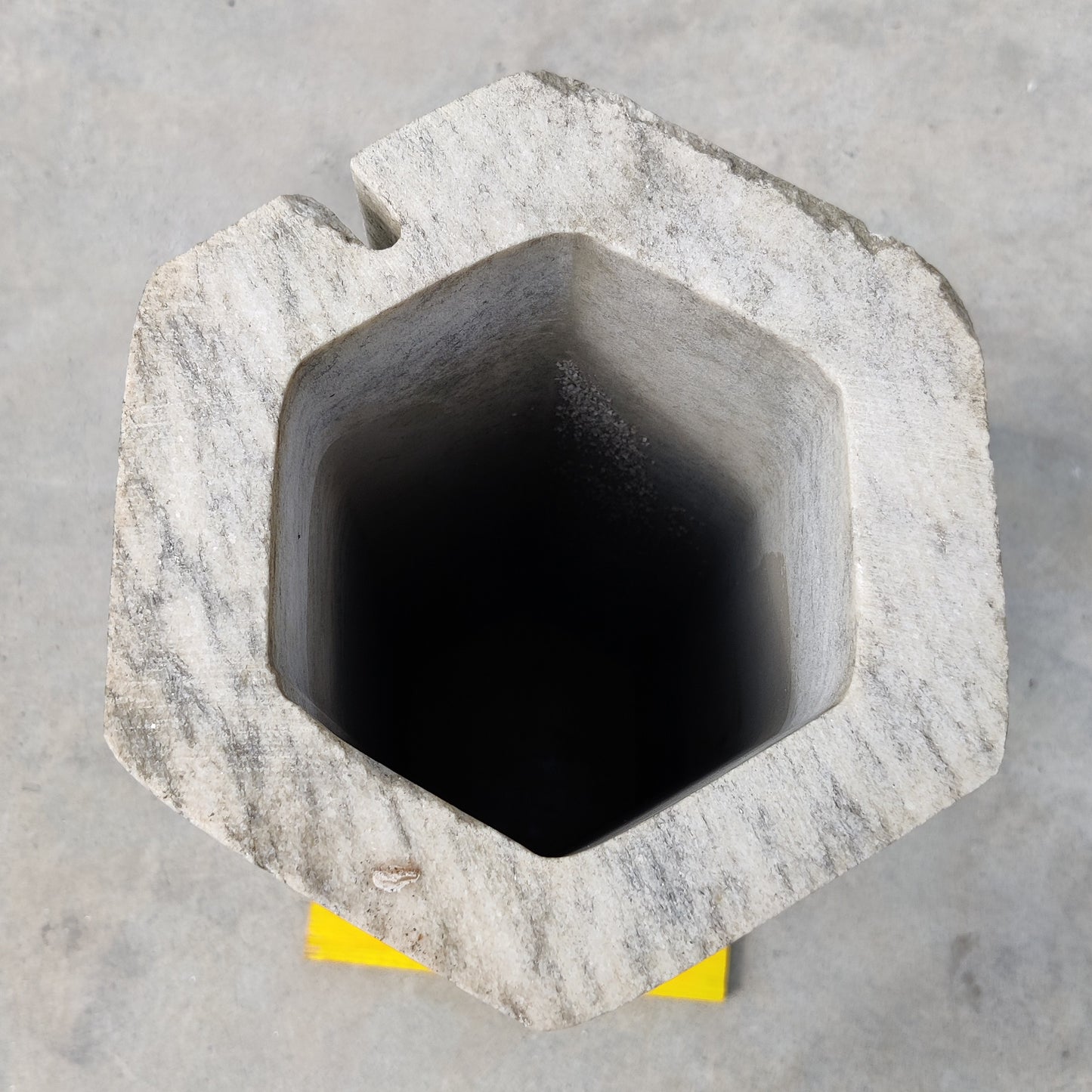 Empty hexagonal cone in Cristallina Green Ondulato marble