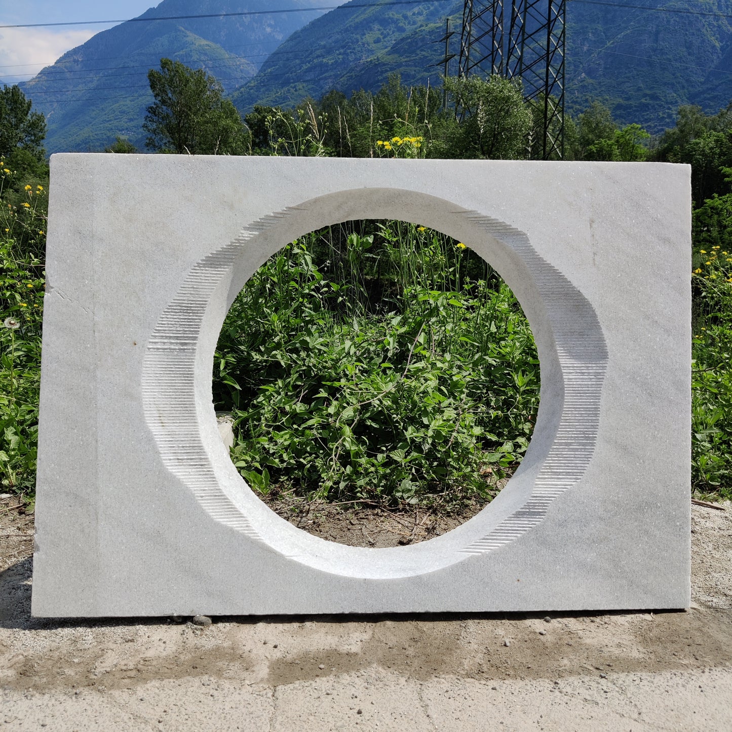 Slab with hole in Cristallina White Venato marble